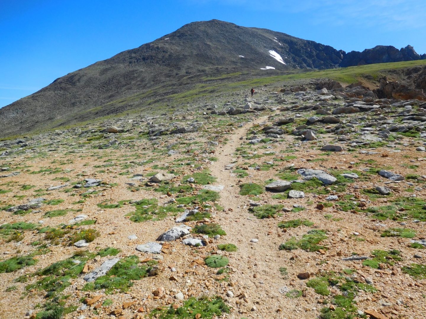 Gaining the southwest ridge requires climbing up a large boulder and talus field with a steep elevation gain