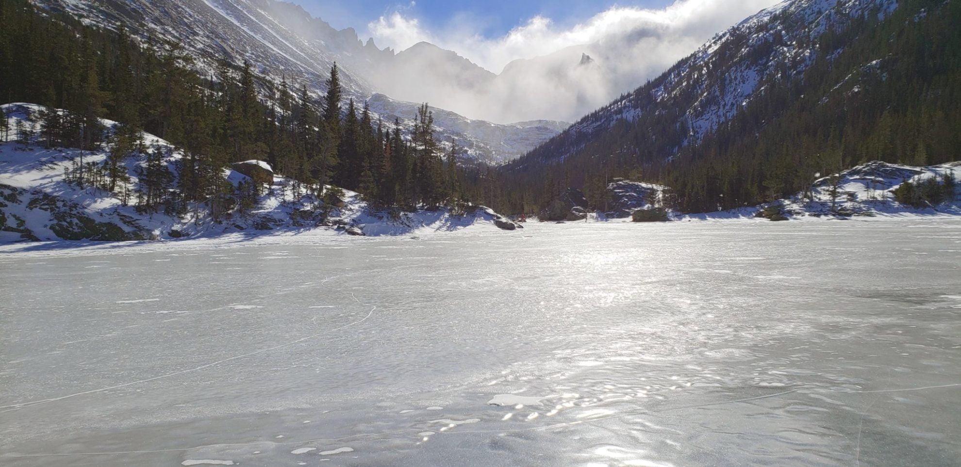 Mills Lake with Storm Peak (left) and Spearhead (right) rising above the blowing snow